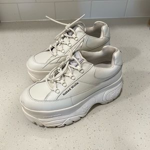 Naked Wolfe 6.5 women’s sporty platform sneaker. Size runs small fits like a 6.